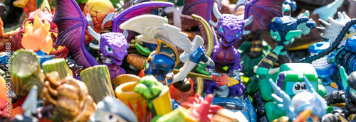 closeup of pile of plastic characters for waste or consumption photo