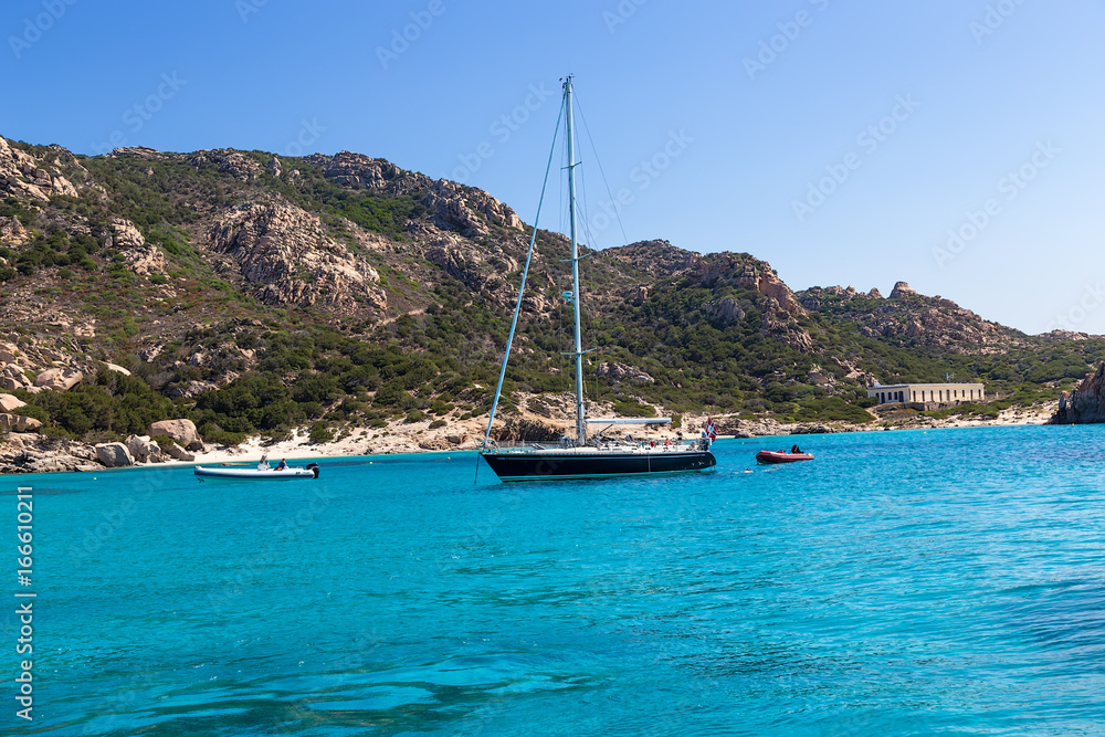 Archipelago of La Maddalena, Italy. Tourist boats and yachts in a picturesque bay