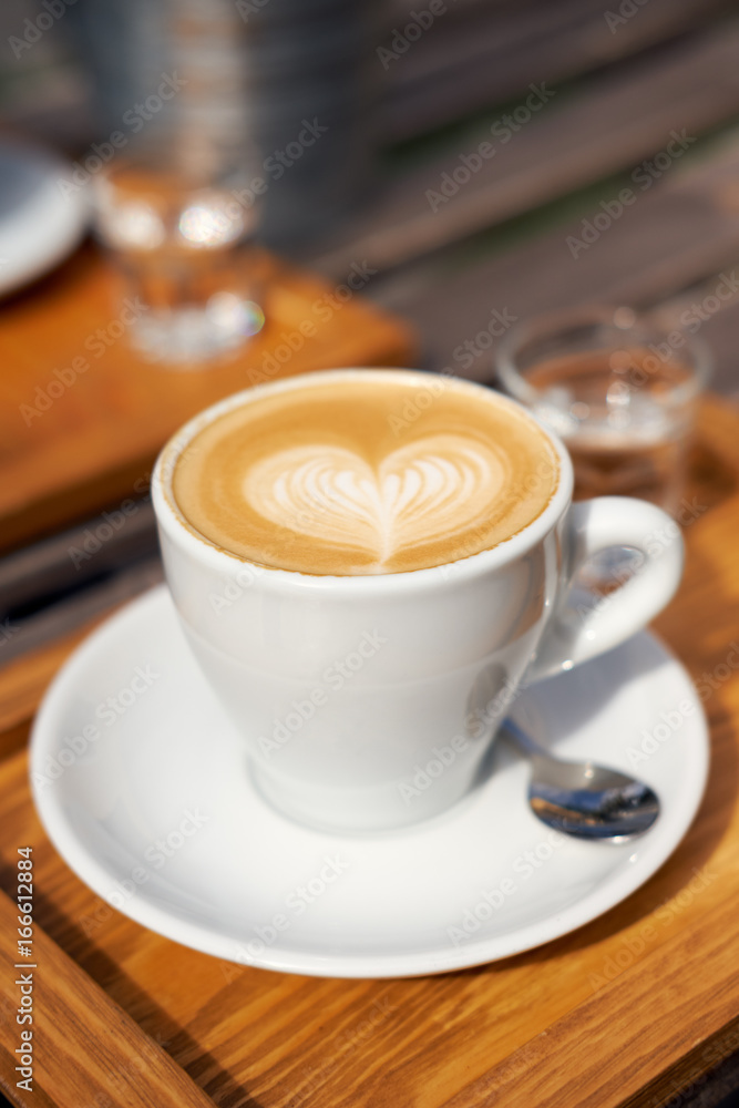 Two cups of cappuccino on the table Two cups of cappuccino on the table
