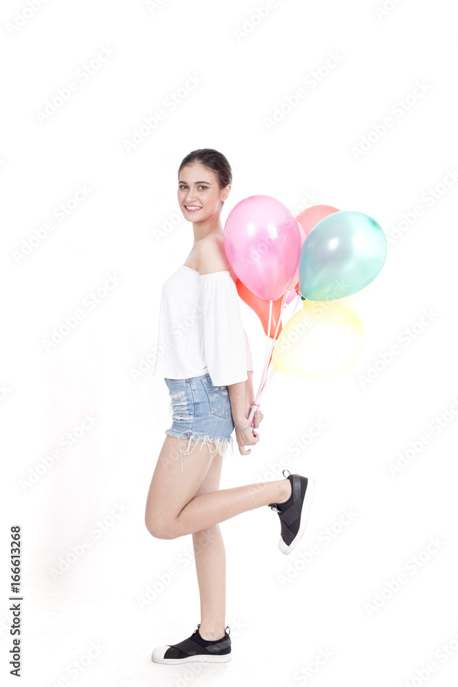 Young beautiful asian woman holding colorful balloon with happy emotion and fun, isolated on white background. Young beautiful asian woman holding colorful balloon with happy emotion and fun, isolated on white background.