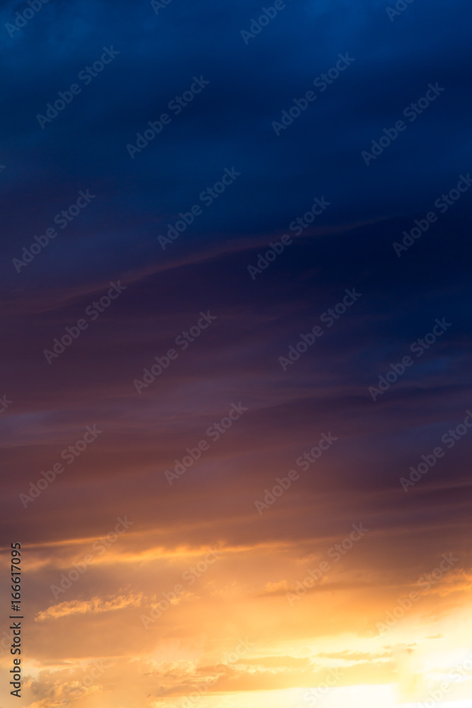 Fototapeta premium Clouds at sunset as background