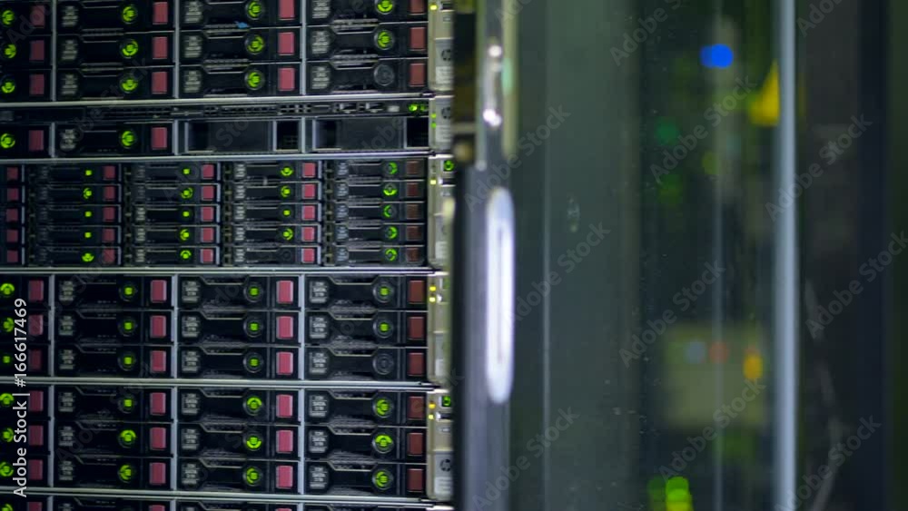 A server cabinet filled full with hard disks. A server cabinet filled full with hard disks.