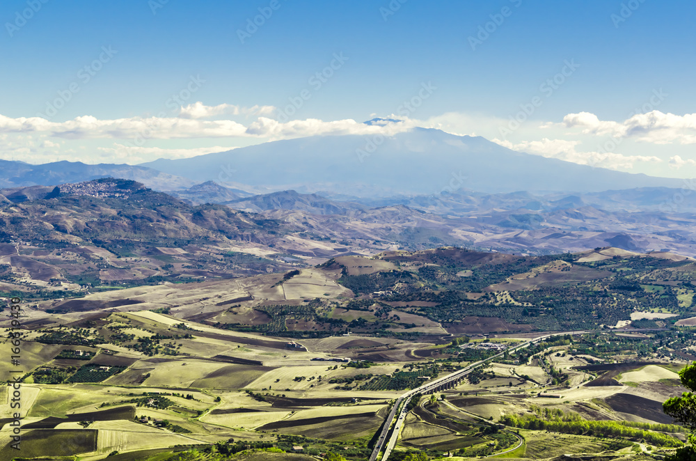 Fototapeta premium Geography of the Sicilian territory seen from the city of erice and with the volcano Etna as a backdrop