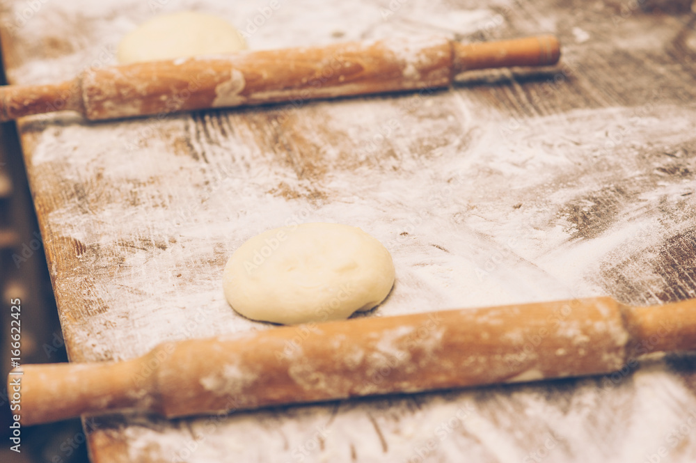 Making pastries from dough with stuffing. 