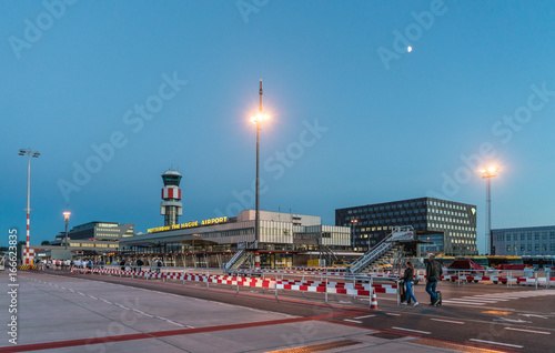 Rotterdam, The Netherlands, July 2 2017: travelors walking to the main building of the Rotterdam The Hague airport