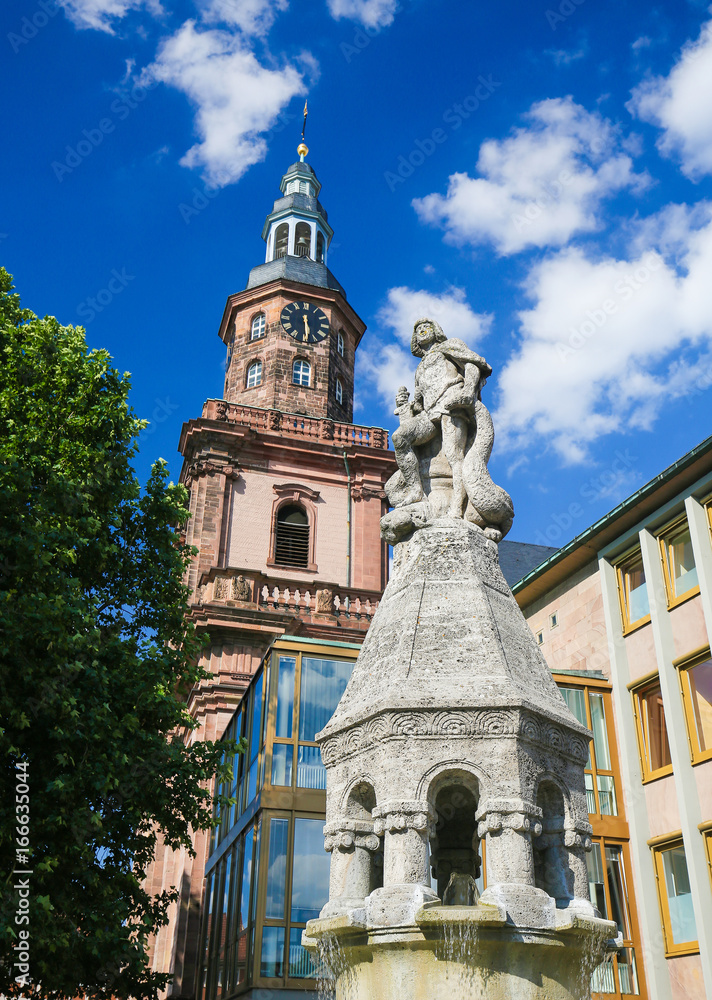 Siegfried Statue and Holy Trinity Church in Worms, Germany Siegfried Statue and Holy Trinity Church in Worms, Germany