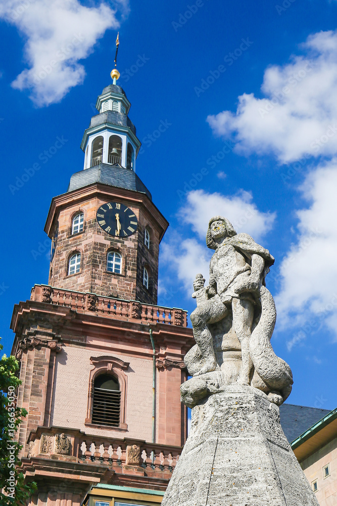 Siegfried Statue and Holy Trinity Church in Worms, Germany Siegfried Statue and Holy Trinity Church in Worms, Germany