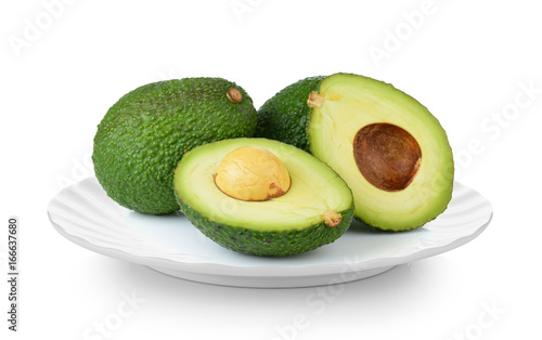 avocado in white plate on white background