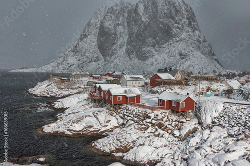 Natural Snowy View of Hamnoy Village at Lofoten Islands Shot from Upper Location or Observing Point photo