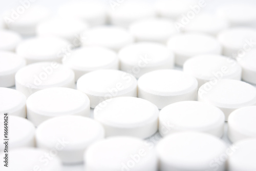 pattern of white round pills