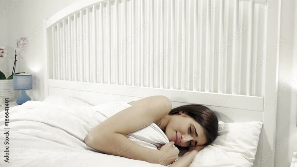 Woman crying in bed after fight with boyfriend slow motion Woman crying in bed after fight with boyfriend slow motion