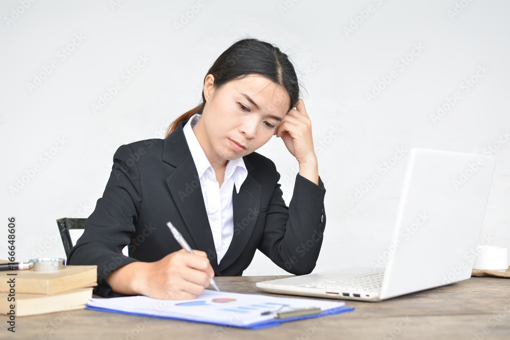Close up of businesswomen writing on paper sheet in office selective and soft focus Close up of businesswomen writing on paper sheet in office selective and soft focus