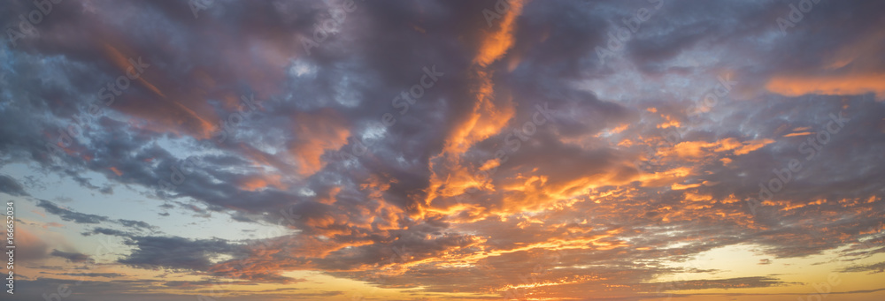 Fiery sunset, colorful clouds in the sky