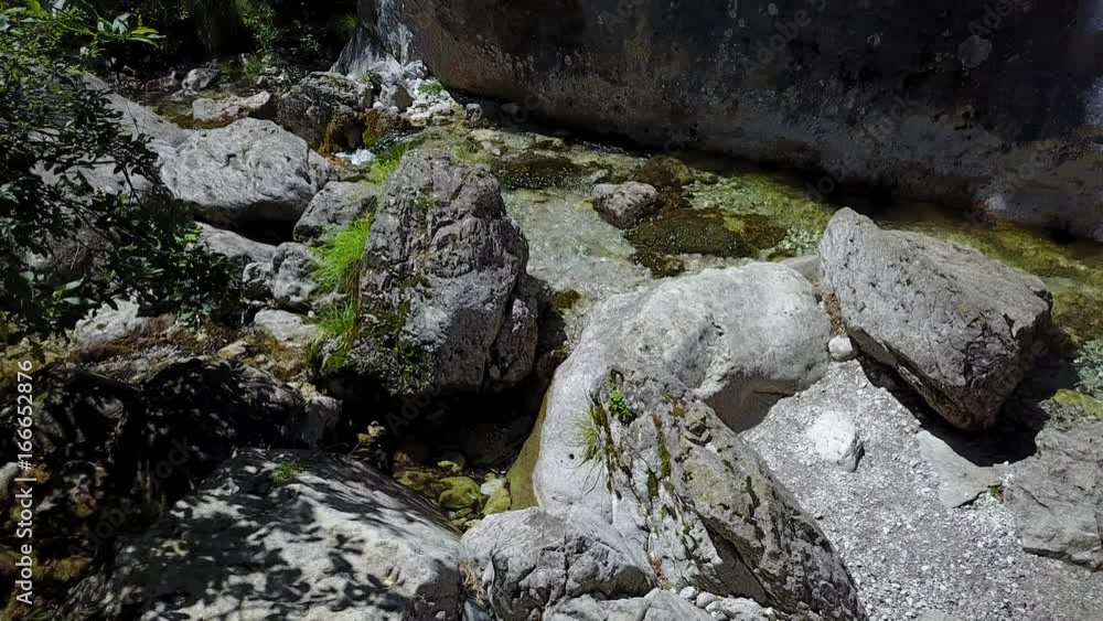 The waterfalls, the stream and the clear and clear water of Val Vertova, a naturalistic oasis in the province of Bergamo, Italy The waterfalls, the stream and the clear and clear water of Val Vertova, a naturalistic oasis in the province of Bergamo, Italy