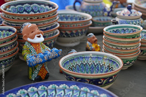 The counter with Oriental dishes, bowls and plates, ceramics oriental patterns