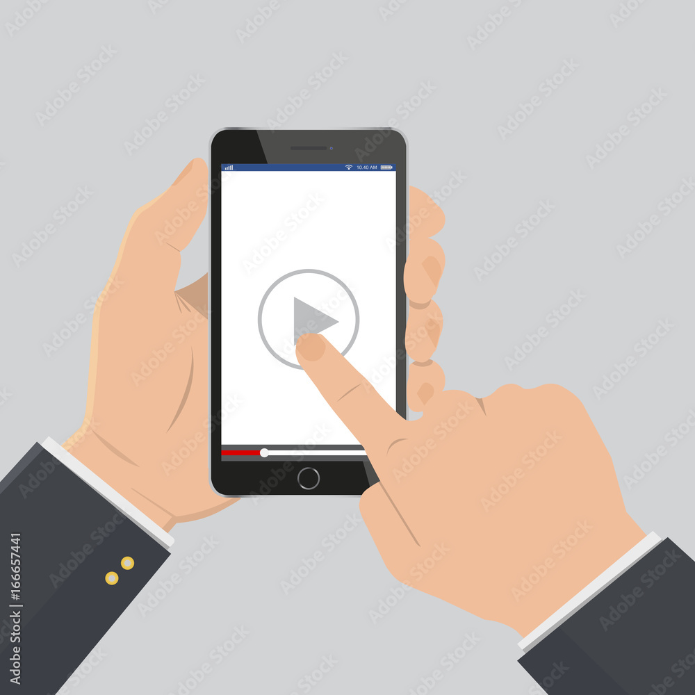 Hand pointing to play button on a smartphone to watch video tutorial.