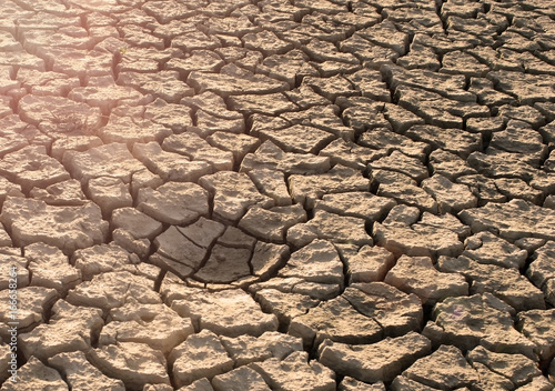 Changing of the climate. Background of dry cracked soil. © AndyEmel
