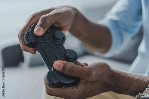 Man playing with joystick