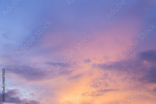 golden sky at dusk with colorful clouds Look beautiful. © popetorn