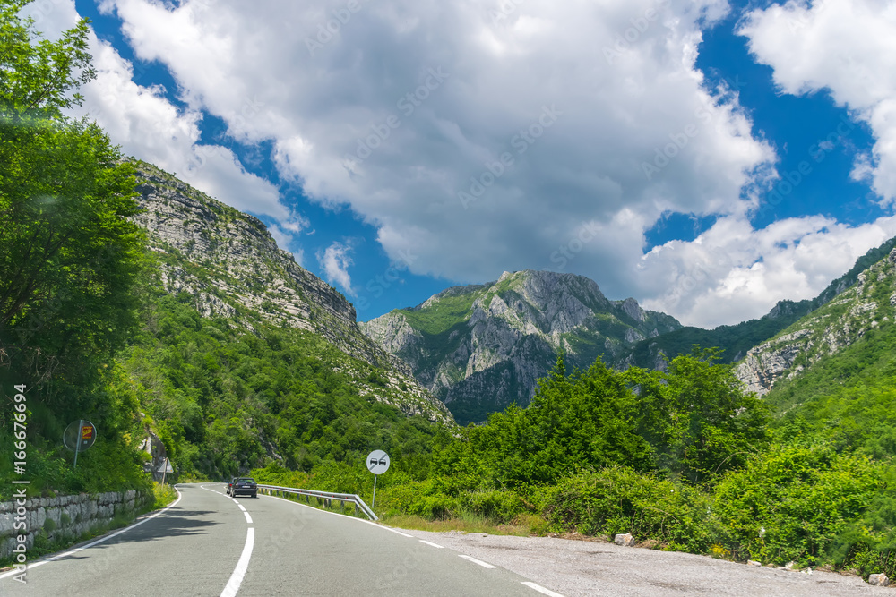 A picturesque journey along the roads of Montenegro among rocks and tunnels. The river Moraca.