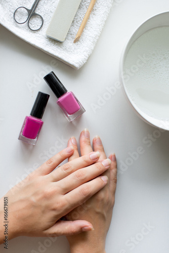 Two soft hand lying on the white table