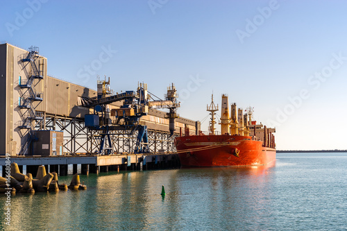 Bulk-carrier ship in a port. Transportation and logistic