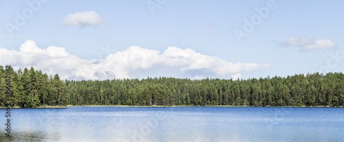 Fototapeta Naklejka Na Ścianę i Meble -  Beautiful sunny summer day next to lake in Finland