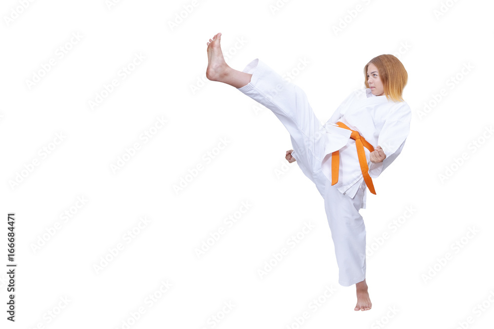 Adult girl athlete beats kicking against white background Adult girl athlete beats kicking against white background
