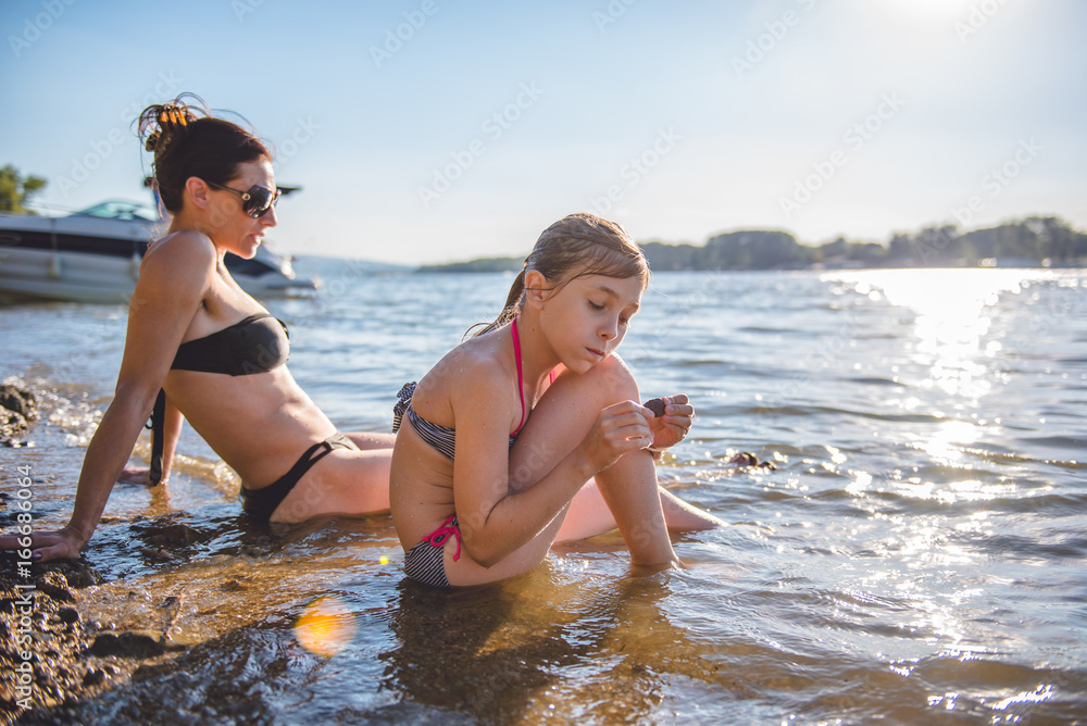 Mother and daughter on the beach Mother and daughter on the beach
