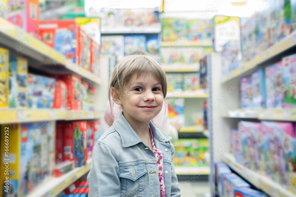 Little girl in   toy store