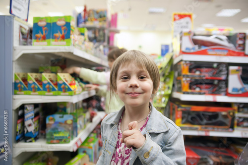 child in toy store
