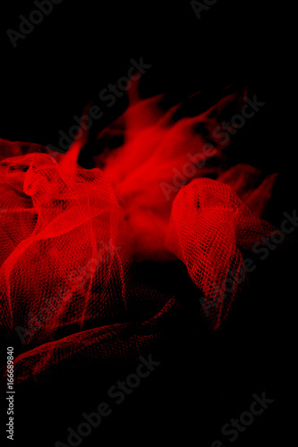 red net black back drop fish net ghost fishing erotic metaphor graphic