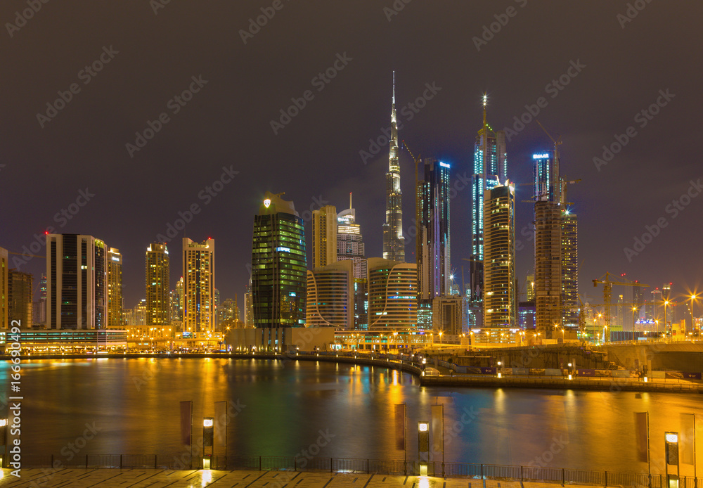 DUBAI, UAE - MARCH 24, 2017: The evening skyline over the Canal and Downtown.