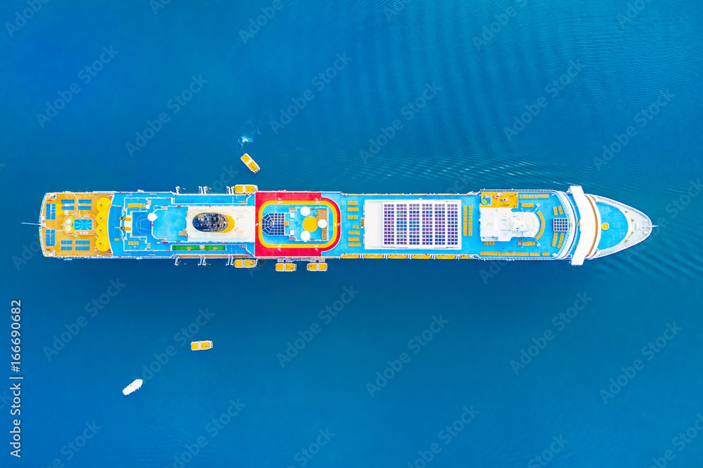 Top view of a colorful cruise liner in the blue sea Top view of a colorful cruise liner in the blue sea