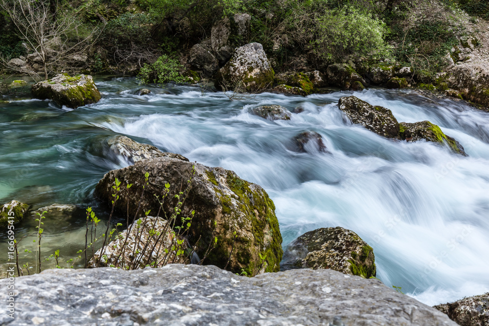 The Sorgues river at Fontaine les Vaucluse in the south of France The Sorgues river at Fontaine les Vaucluse in the south of France