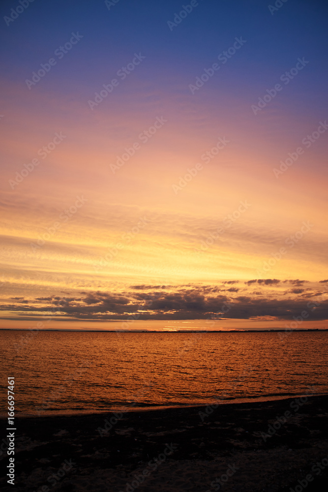  colorful sunset at Vadum beach in Denmark        