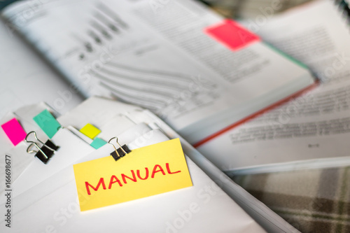 Manual; Stack of Documents with Large Amount of Analytic Material.