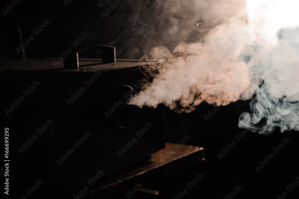 lights in smoke, studio lights shining through the smoke from smoke machine. lights in smoke, studio lights shining through the smoke from smoke machine.