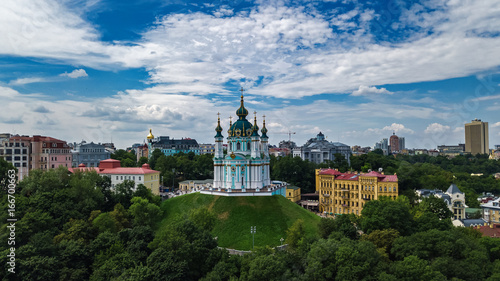 Aerial top view of Saint Andrew's church and Andreevska street from above, Podol district, city of Kiev (Kyiv), Ukraine 