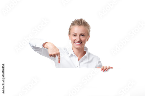 Woman is pointing at a subscription button down below photo