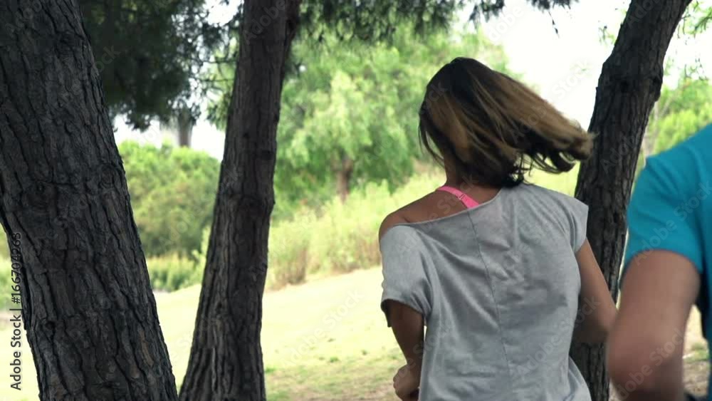 Young couple jogging in park, super slow motion 240fps
Young couple jogging in park, super slow motion 240fps