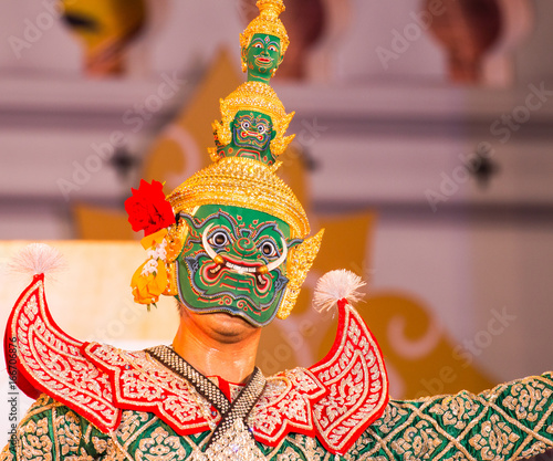 Face mask with traditional thai costume in Bangkok, Thailand photo