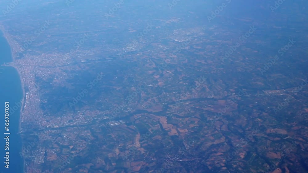 View from the airplane window. Flight over Italy View from the airplane window. Flight over Italy