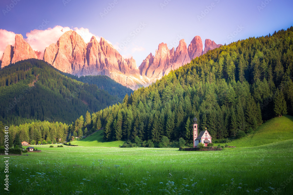 Traditional alpine St Johann church in Val di Funes valley, Santa Maddalena touristic village, Dolomites, Italy, Europe