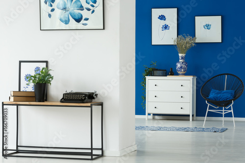 Wooden desk by the wall