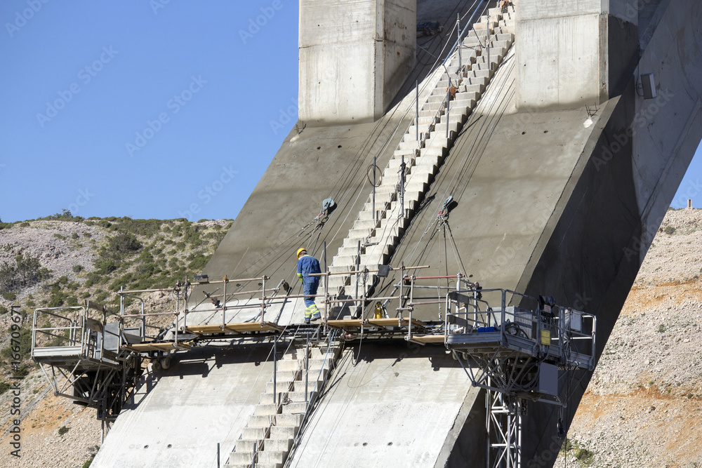 Renewing corrosion damages on arch and pillars of concrete bridge Maslenica on A1 highway in Croatia