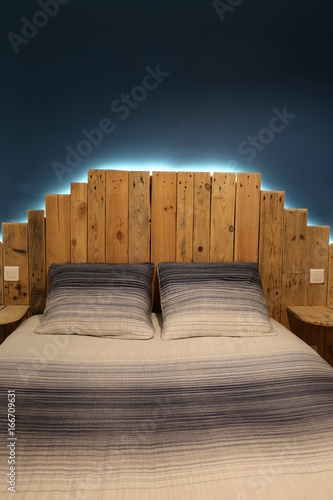 Rustic bed with modern led light made of pallets