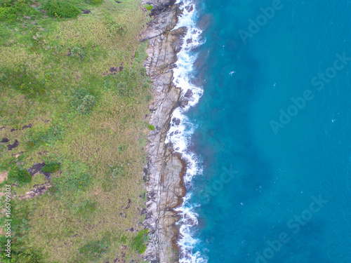 Sea aerial view,Top view,amazing nature background.The color of the water and beautifully bright.Azure beach with rocky mountains and clear