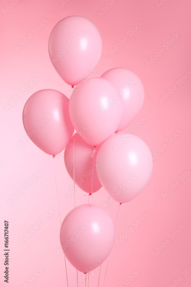 closeup of balloons isolated on pink background