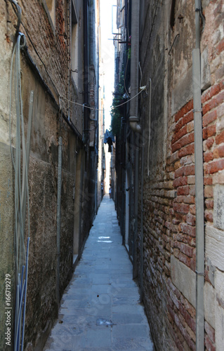 Narrow street with the walls of homes almost touching